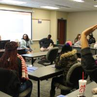 Students learning about grad school at Saint Louis University